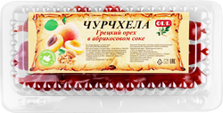 Чурчхела с грецким орехом в абрикосовом соке, весовая, крупный план