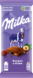 Шоколад молочный MILKA с фундуком и изюмом, 80г, крупный план