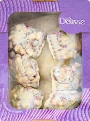 Десерт DELISSE со вкусом клюквы с изюмом и арахисом, в белой глазури, 700г, фотография