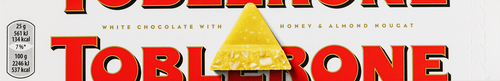 Шоколад белый TOBLERONE с медово-миндальной нугой, 100г, фото