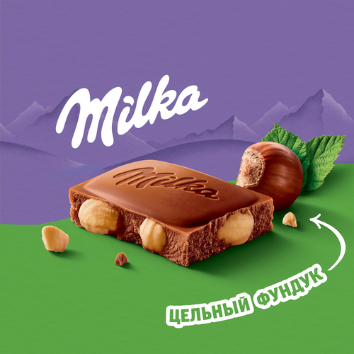 Шоколад молочный MILKA с цельным фундуком, 80г, крупный план