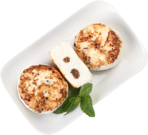 Сырники Домашние с изюмом, крупный план